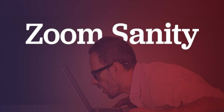 A person staring very closely at a laptop screen.