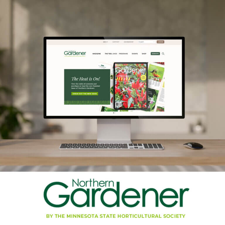 Computer displaying Northern Gardener website with magazine cover and logo below