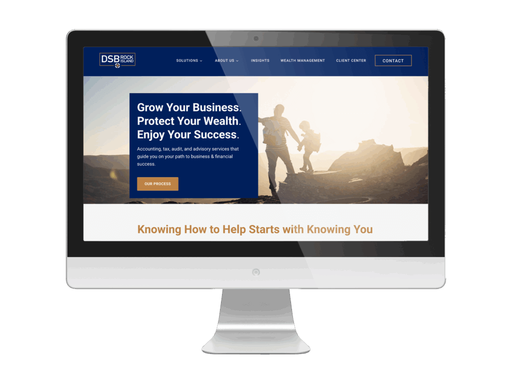 Redesigned DSB Rock Island website displayed on a computer screen, featuring a clean blue and white layout with the headline “Grow Your Business. Protect Your Wealth. Enjoy Your Success.” The page includes a call-to-action button labeled “Our Process” and an image of a family hiking at sunrise, reflecting a professional and approachable brand identity.