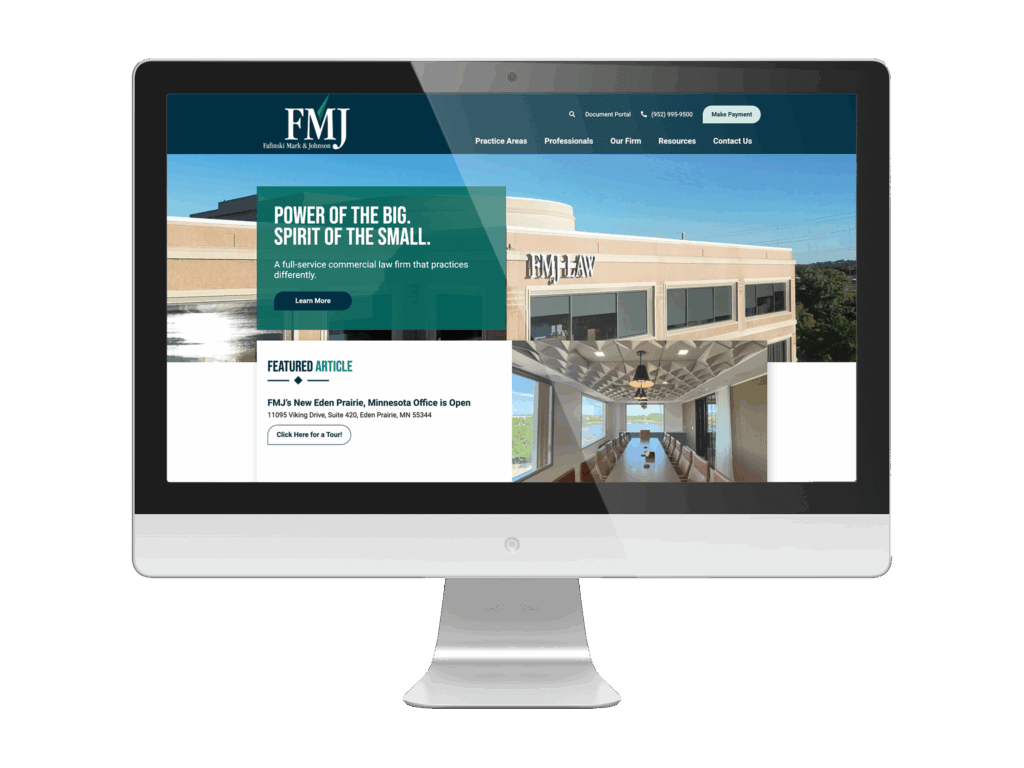 Redesigned FMJ (Fafinski Mark & Johnson) website displayed on a computer screen, featuring a modern layout with a large header image of the law firm’s office building and the message “Power of the Big. Spirit of the Small.” The homepage highlights FMJ’s new Eden Prairie location with clean typography and teal accents.