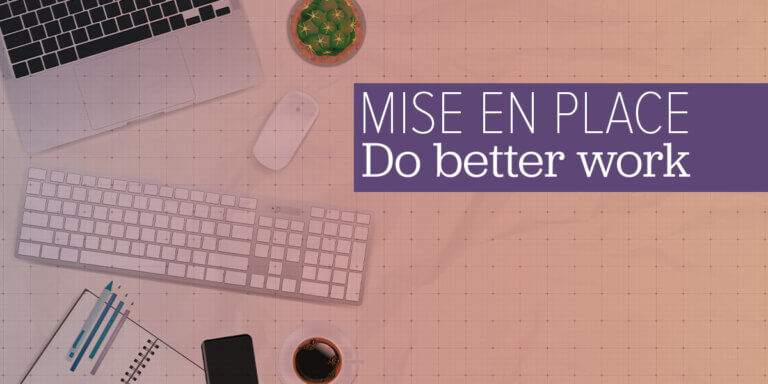 Top-down view of an organized workspace with a laptop, keyboard, notebook, phone, and coffee arranged neatly on a grid background with the text "Mise en Place: Do better work"